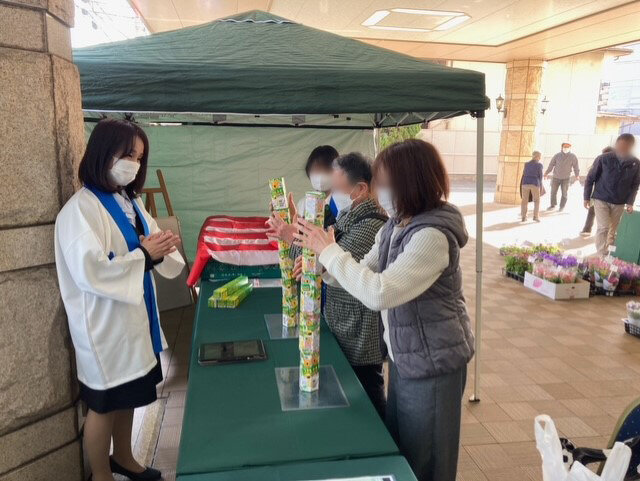 メイン会場にてシステムをご案内
