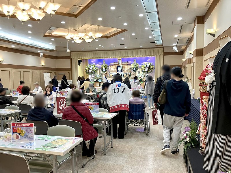 メイン会場にてシステムをご案内